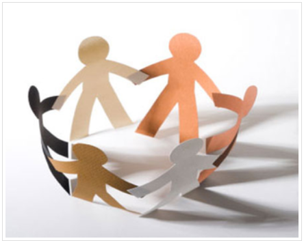 paper children standing in a circle holding hands.